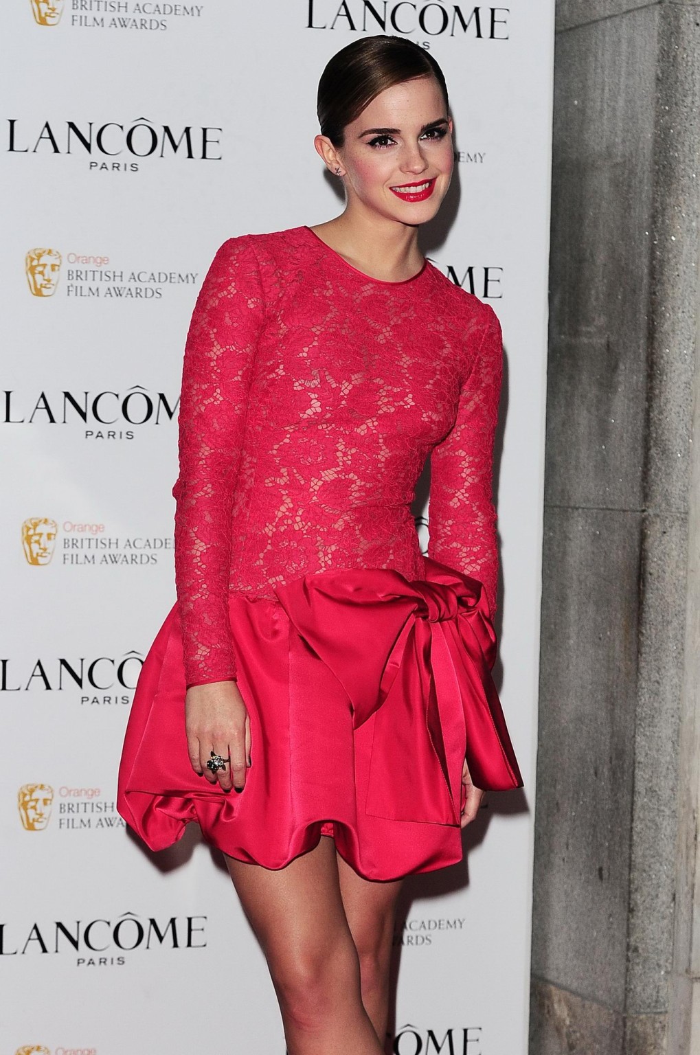 Emma Watson braless wearing red see through lace dress at pre-BAFTA 2012 party #75274452