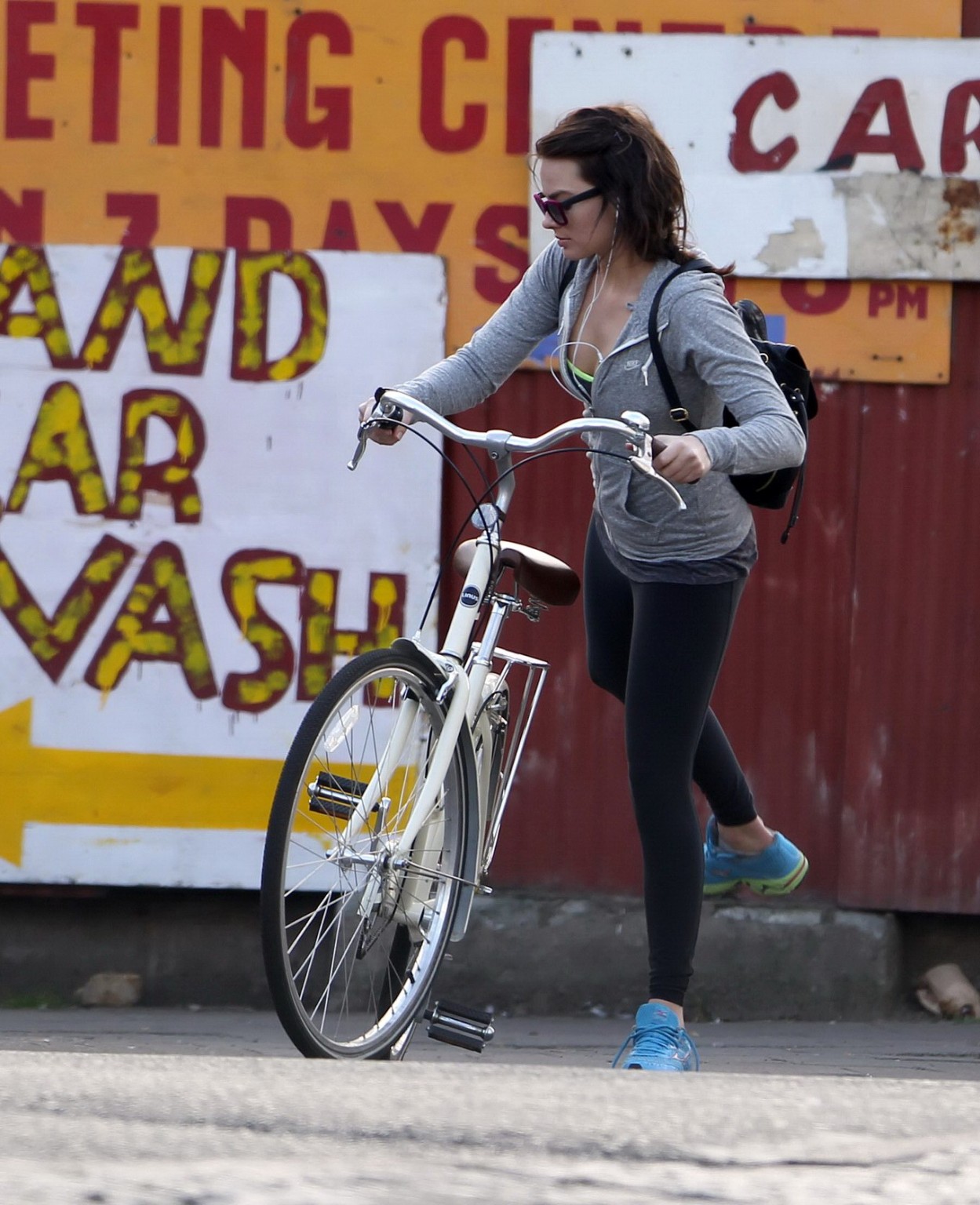 Margot Robbie in black tights cycling out in London #75199270