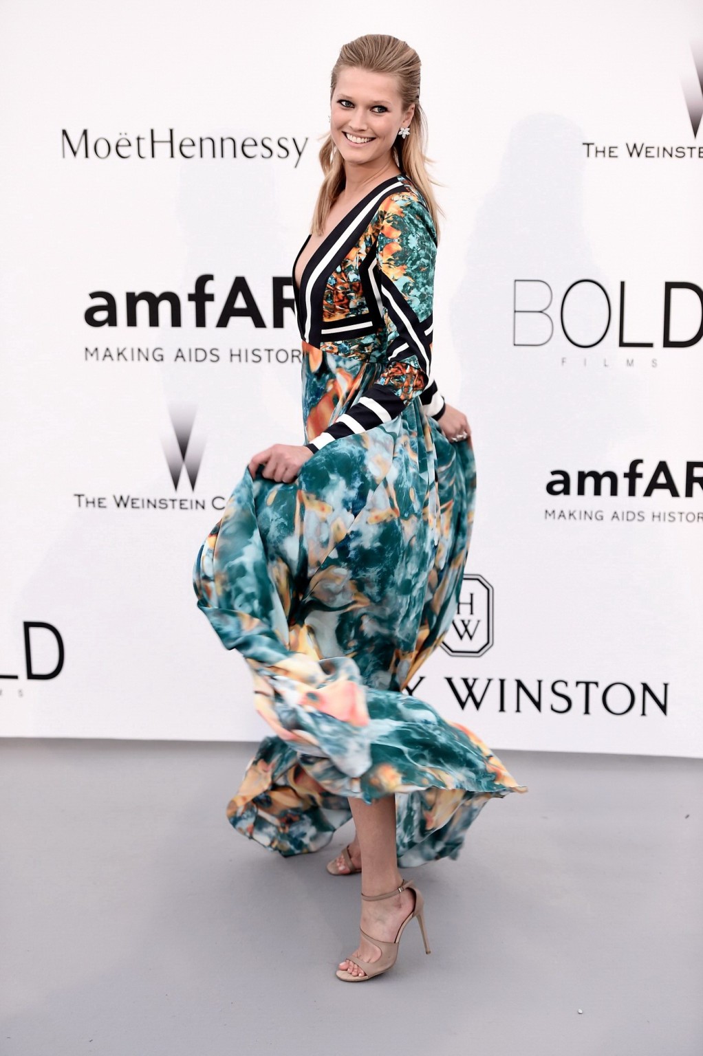 Toni Garrn Leggy  Braless Wearing A Wide Open Dress At AmfARs 22nd Cinema Agains