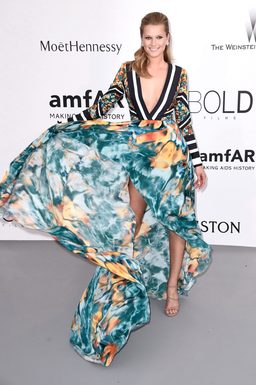 Toni Garrn leggy  braless wearing a wide open dress at amfARs 22nd Cinema Agains #75163219