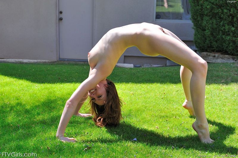Flexible redhead does naked cartwheels on golf course #67317902