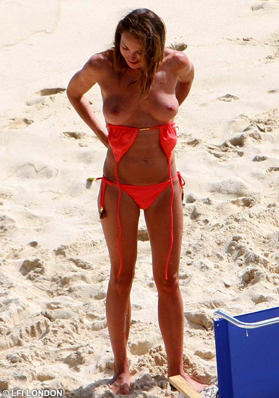 Tamara Mellon exposing her nice big boobs on beach and sexy in bikini #75322599