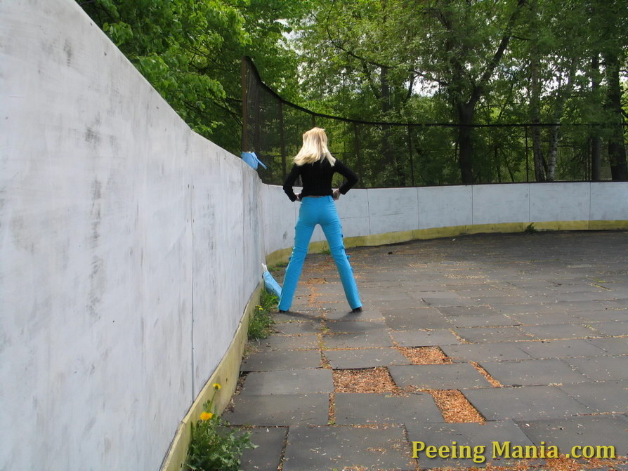 Blonde girl peeing outdoors unsuspecting of a voyeur with a spy cam #76568879