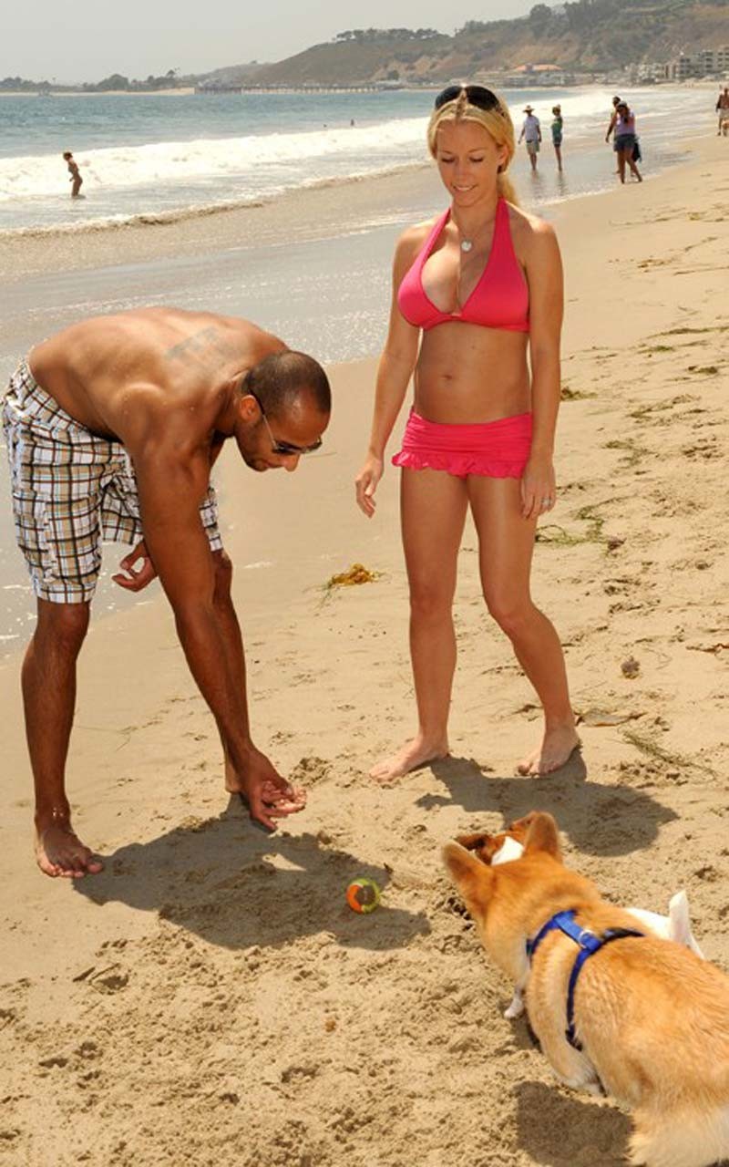 Kendra Wilkinson leggy in mini skirt and sexy in red bikini on beach #75314943