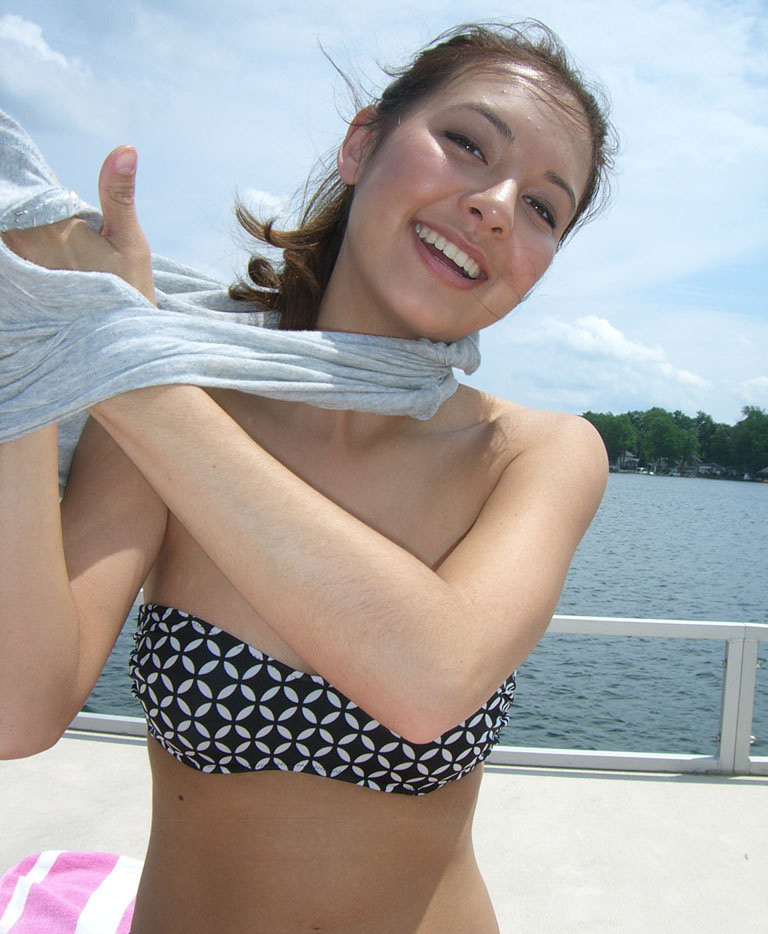 Two very hot nudist babes have a ball at a community beach front #72249522