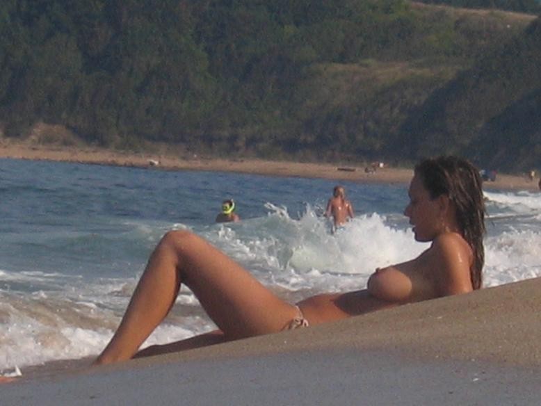 Watch a naked chick at the beach tan her hot body #72253752