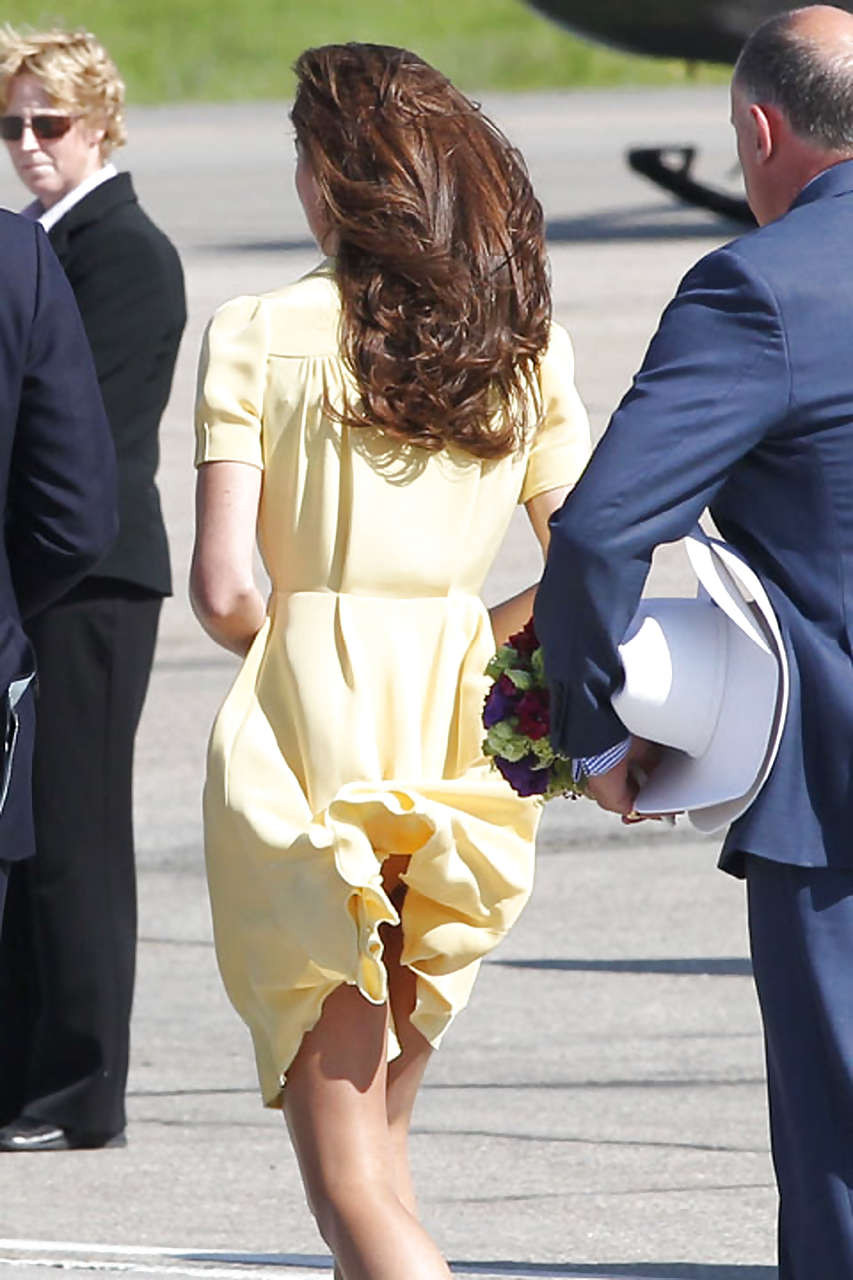 Kate Middleton showing her panties while wind blow her yellow dress #75296882