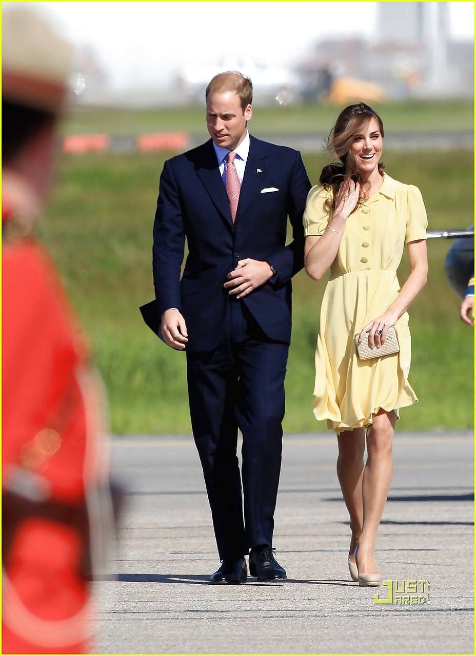 Kate Middleton showing her panties while wind blow her yellow dress #75296902