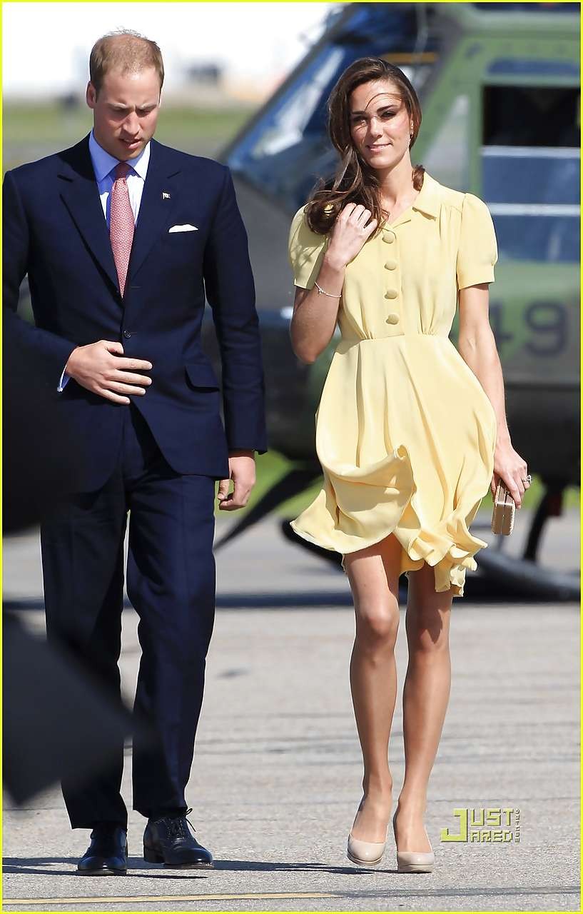 Kate Middleton showing her panties while wind blow her yellow dress #75296910