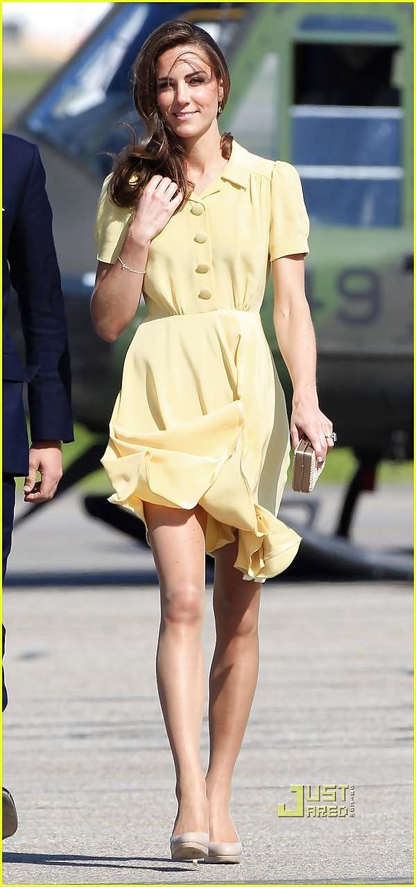 Kate Middleton showing her panties while wind blow her yellow dress #75296919