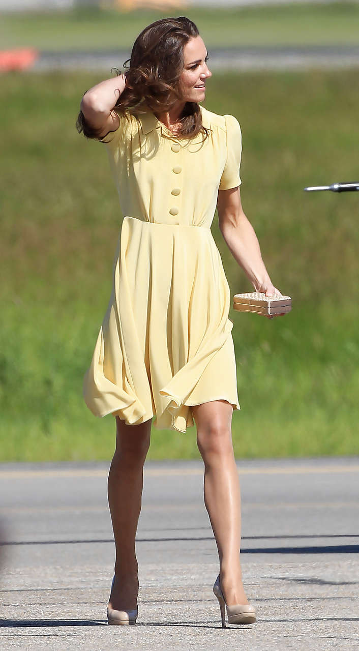 Kate Middleton showing her panties while wind blow her yellow dress #75296923