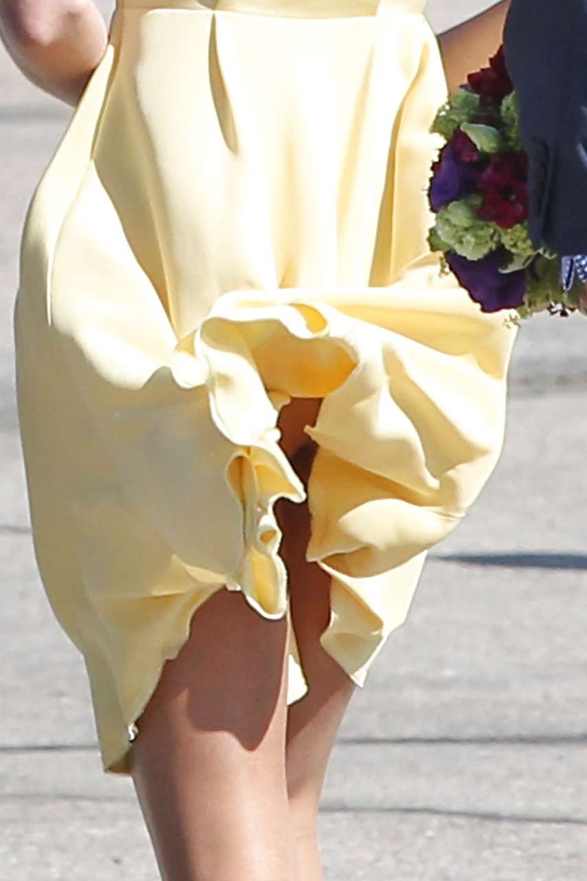 Kate Middleton showing her panties while wind blow her yellow dress #75296939