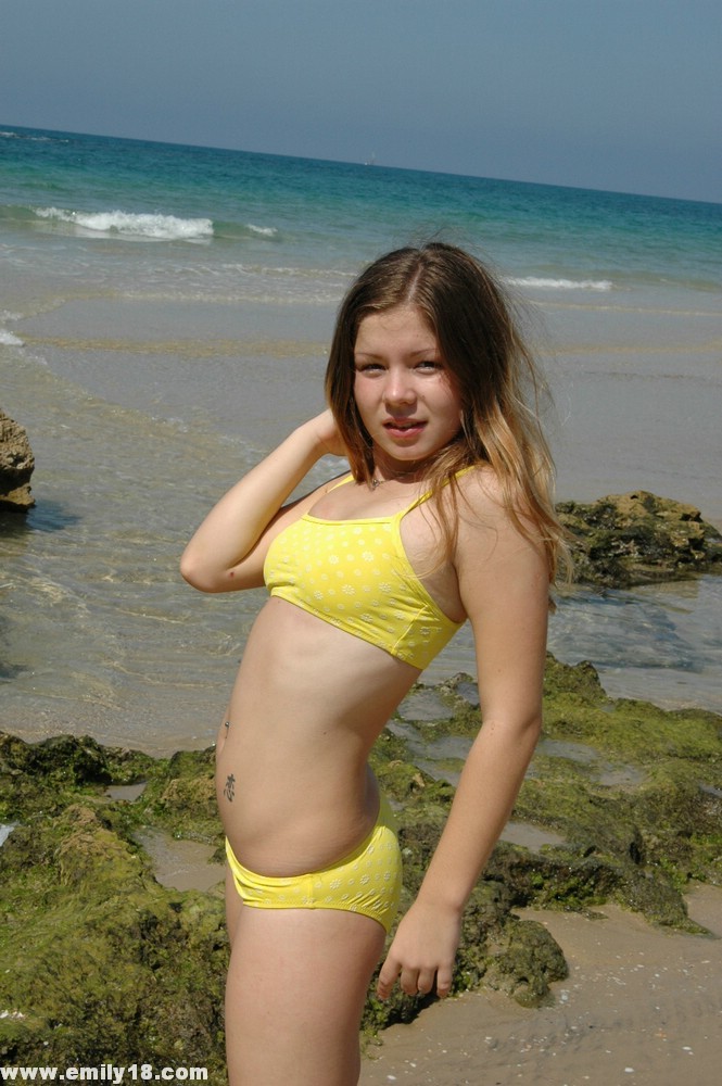 Young Emily In Her Tiny Yellow Bikini #72323163