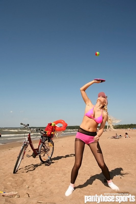 Blonde Victoria doing pantyhose aerobics at seashore #78651249