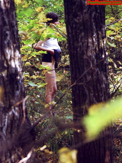 Spying on teen peeing in the forest #78616486