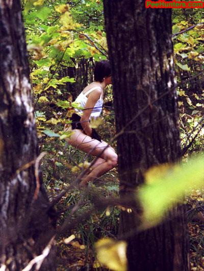 Spying on teen peeing in the forest #78616510