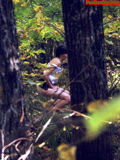 Spying on teen peeing in the forest #78616541