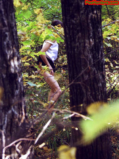 Spying on teen peeing in the forest #78616551