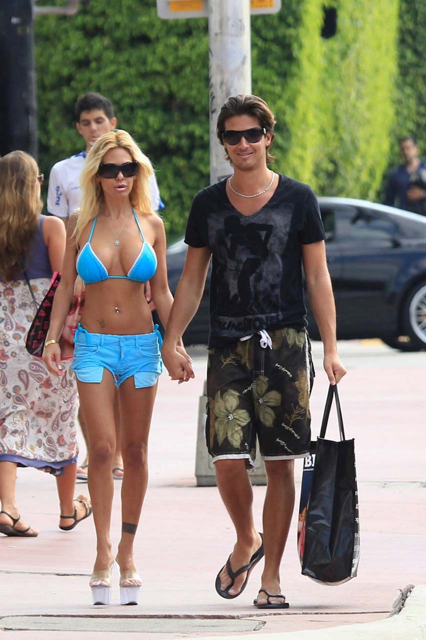 Shauna Sand looking sexy in blue bikini on beach and flashing pussy and tits pap #75316099