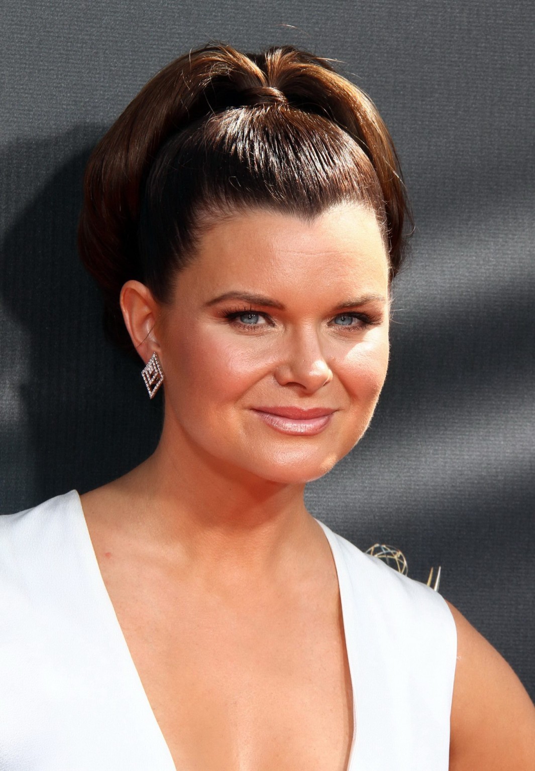 Heather Tom showing huge cleavage at the 42nd Annual Daytime Emmy Awards at Warn #75165768
