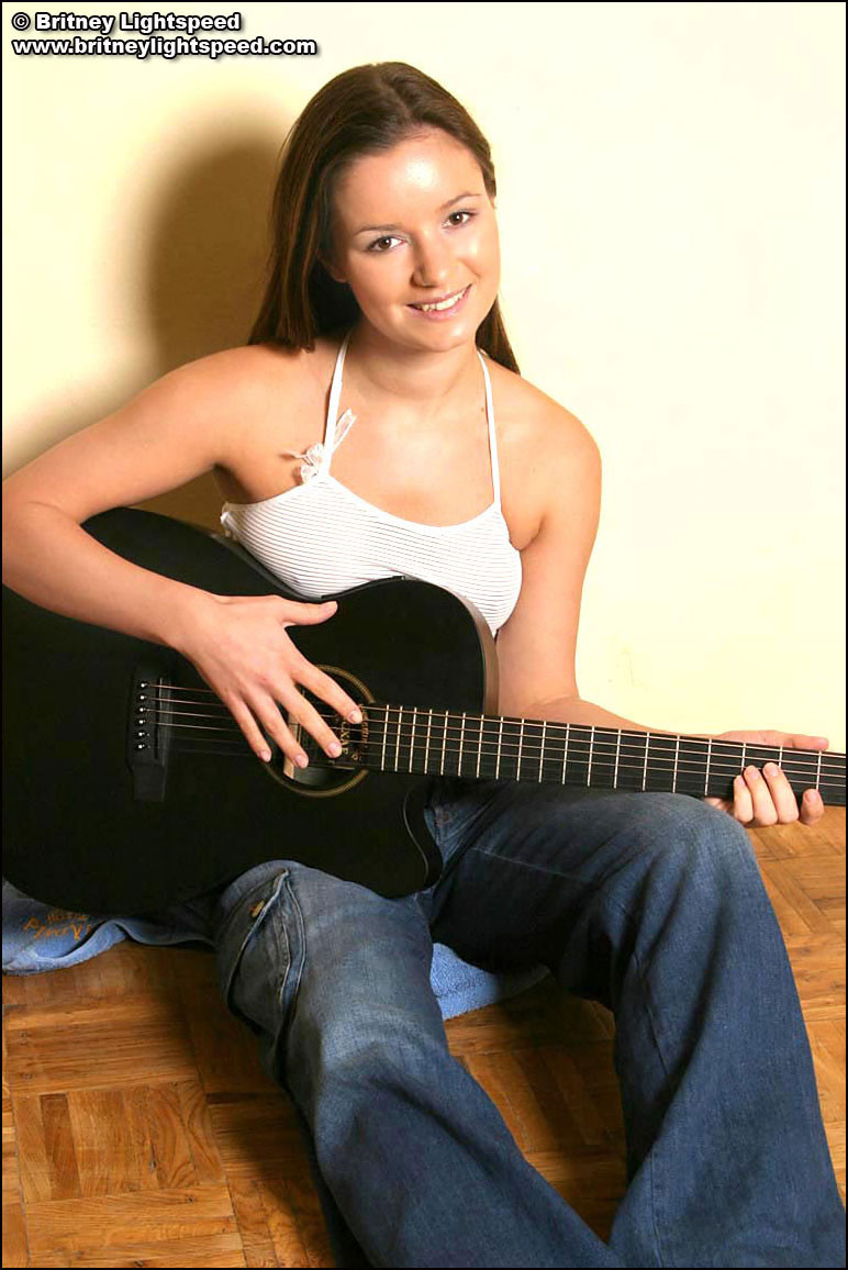 Gorgeous brunette Britney Lightspeed gets distracted from guitar practice #74960402