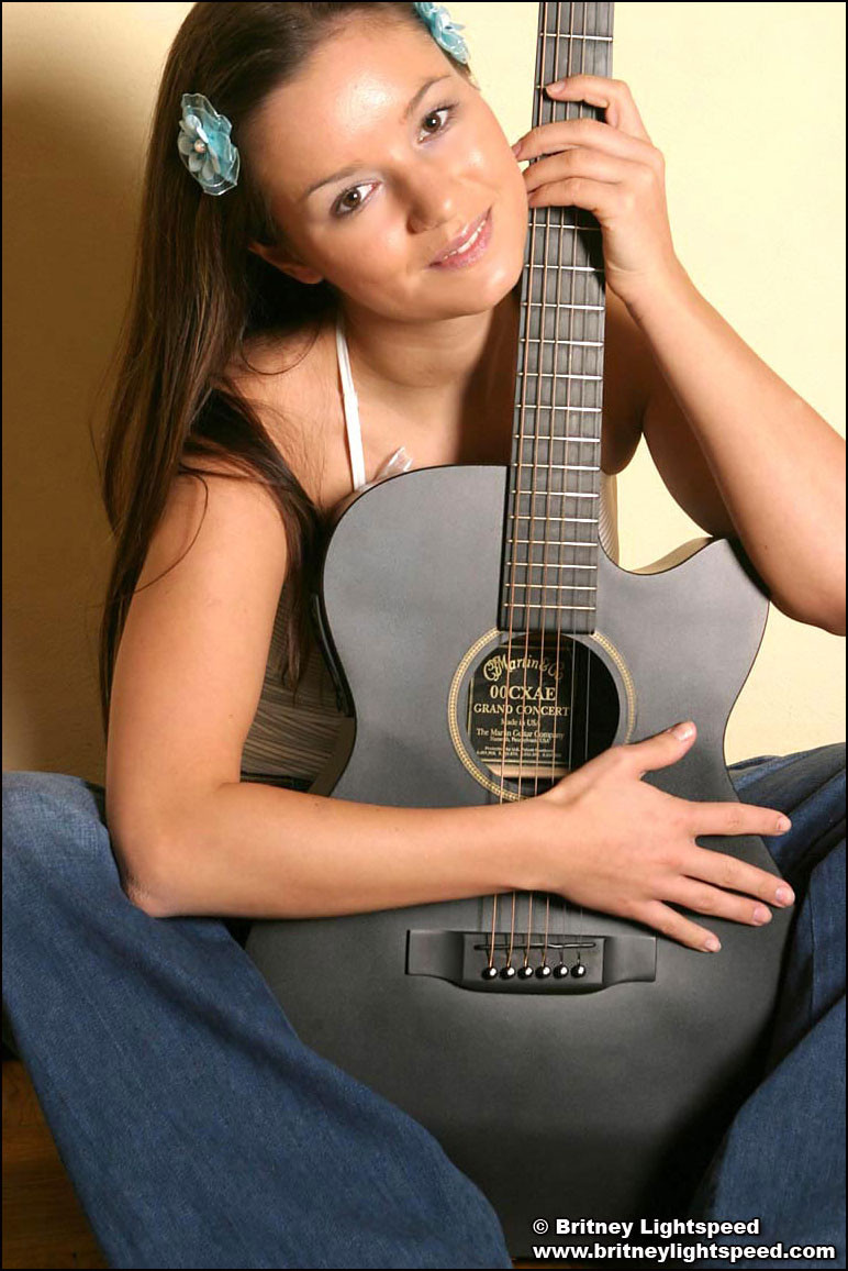 Gorgeous brunette Britney Lightspeed gets distracted from guitar practice #74960412