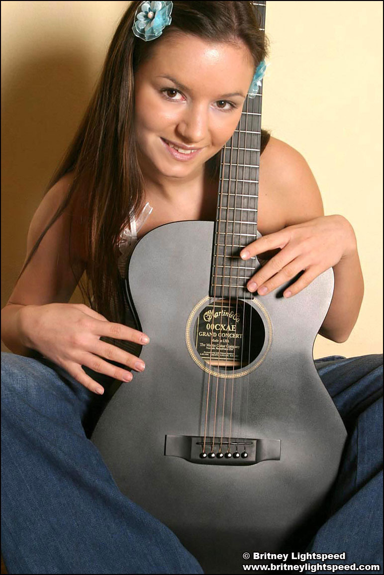 Gorgeous brunette Britney Lightspeed gets distracted from guitar practice #74960510