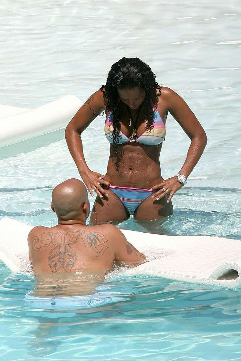Melanie Brown exposing sexy body and huge boobs in bikini on pool #75325951