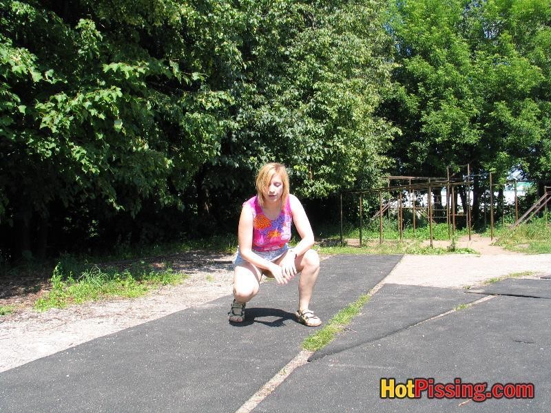 Voluptuous blonde bitch strikes a squatted pose and whizzes in public #76521319