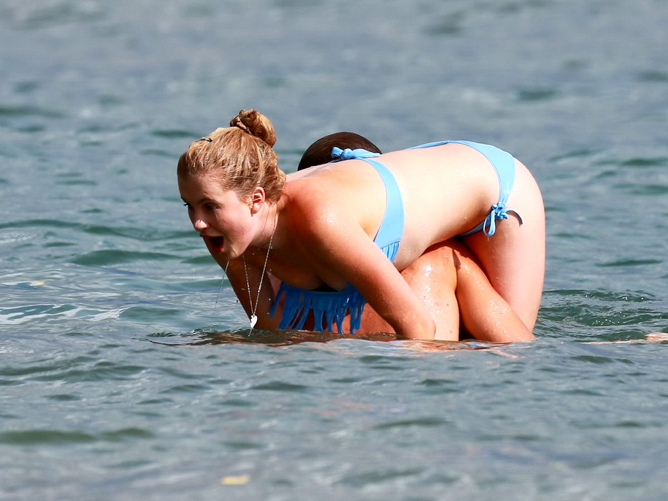 Ireland Baldwin nip slip wearing a tube bikini on a Hawaiian beach #75229034