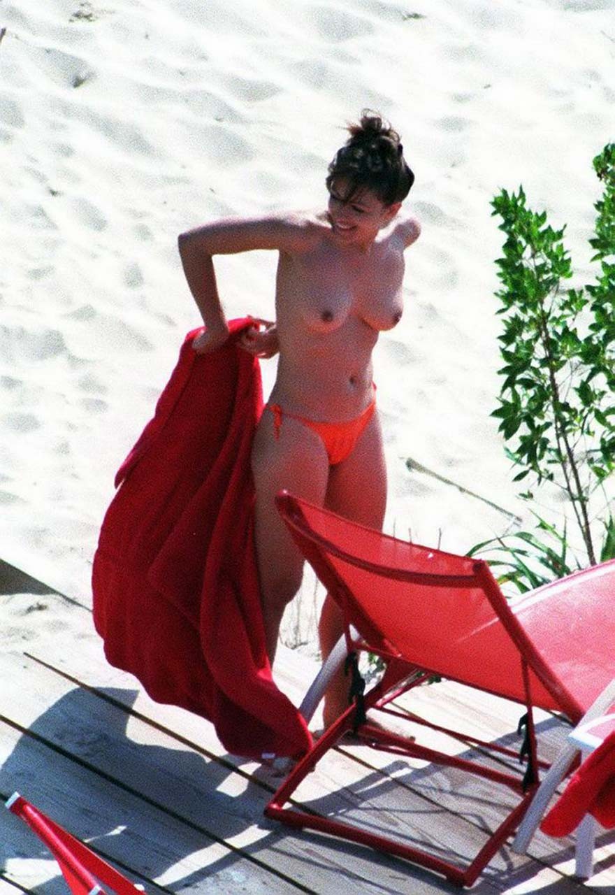 Elizabeth Hurley exposing her sexy nude boobs and hot ass on beach #75316849