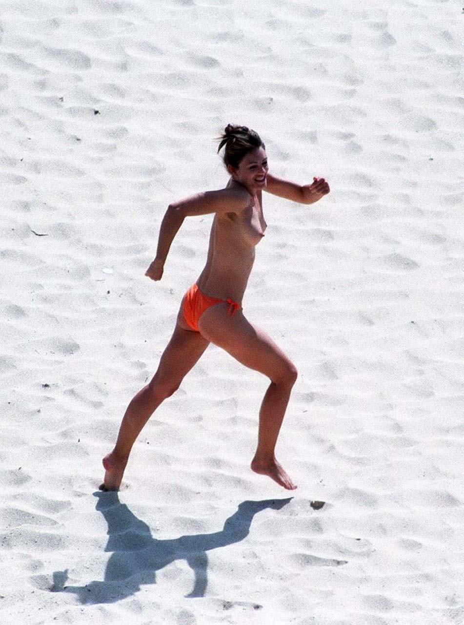 Elizabeth Hurley exposing her sexy nude boobs and hot ass on beach #75316854