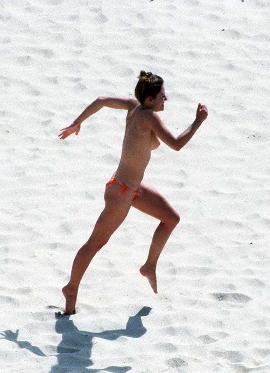 Elizabeth Hurley exposing her sexy nude boobs and hot ass on beach #75316857