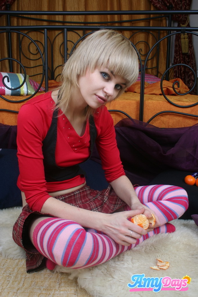 Skinny teen schoolgirl eating fruit #77773758