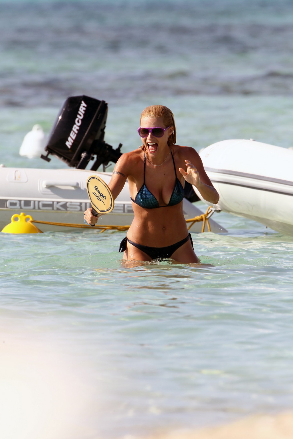 Michelle Hunziker shows off her round ass wearing bikini on Formentera Beach #75297901