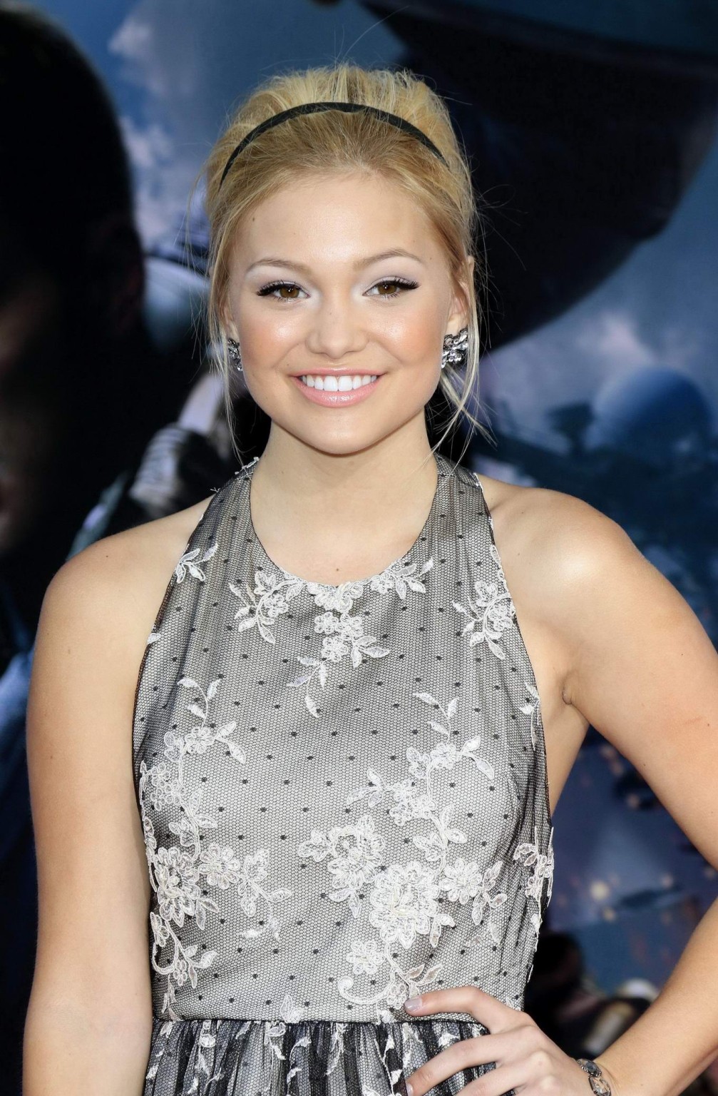 Olivia Holt leggy wearing a mini dress at the 'Captain America: The Winter Soldi #75201959