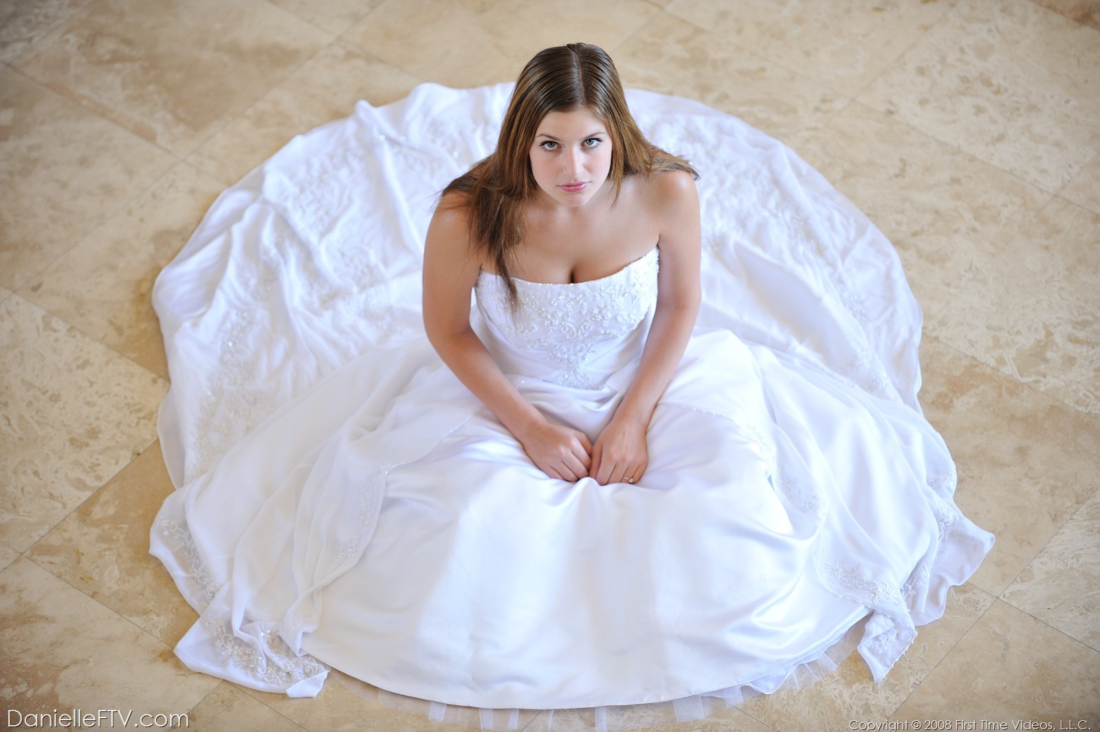 Danielle poses in a long white gown #68501404