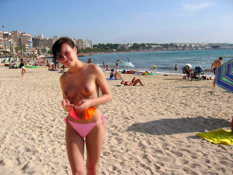 Slim teen with perky boobs naked at a nudist beach #72250448