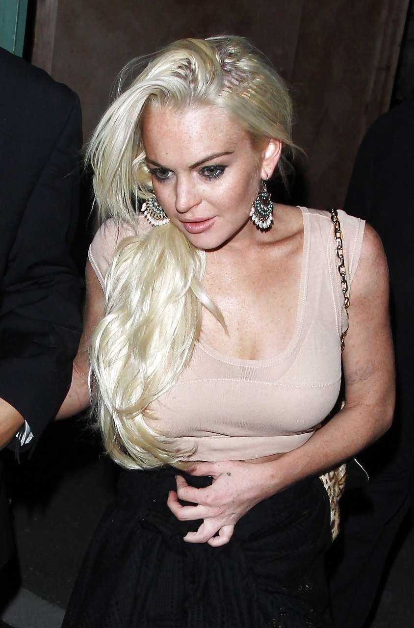 Lindsay Lohan showing her bra under see thru top paparazzi pictures #75291229