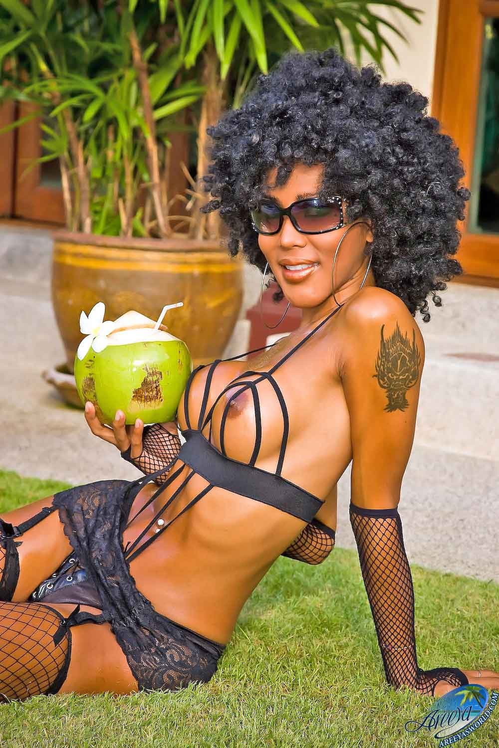 Hot as hell ladyboy drinking from a coconut #77931243