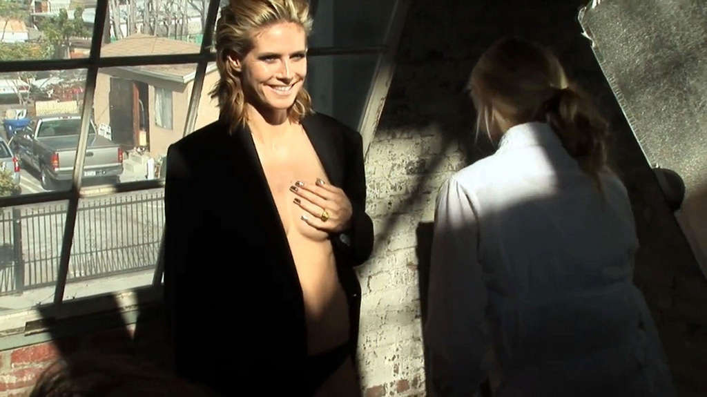 Heidi Klum exposing her nice tits and posing topless on bike #75359381