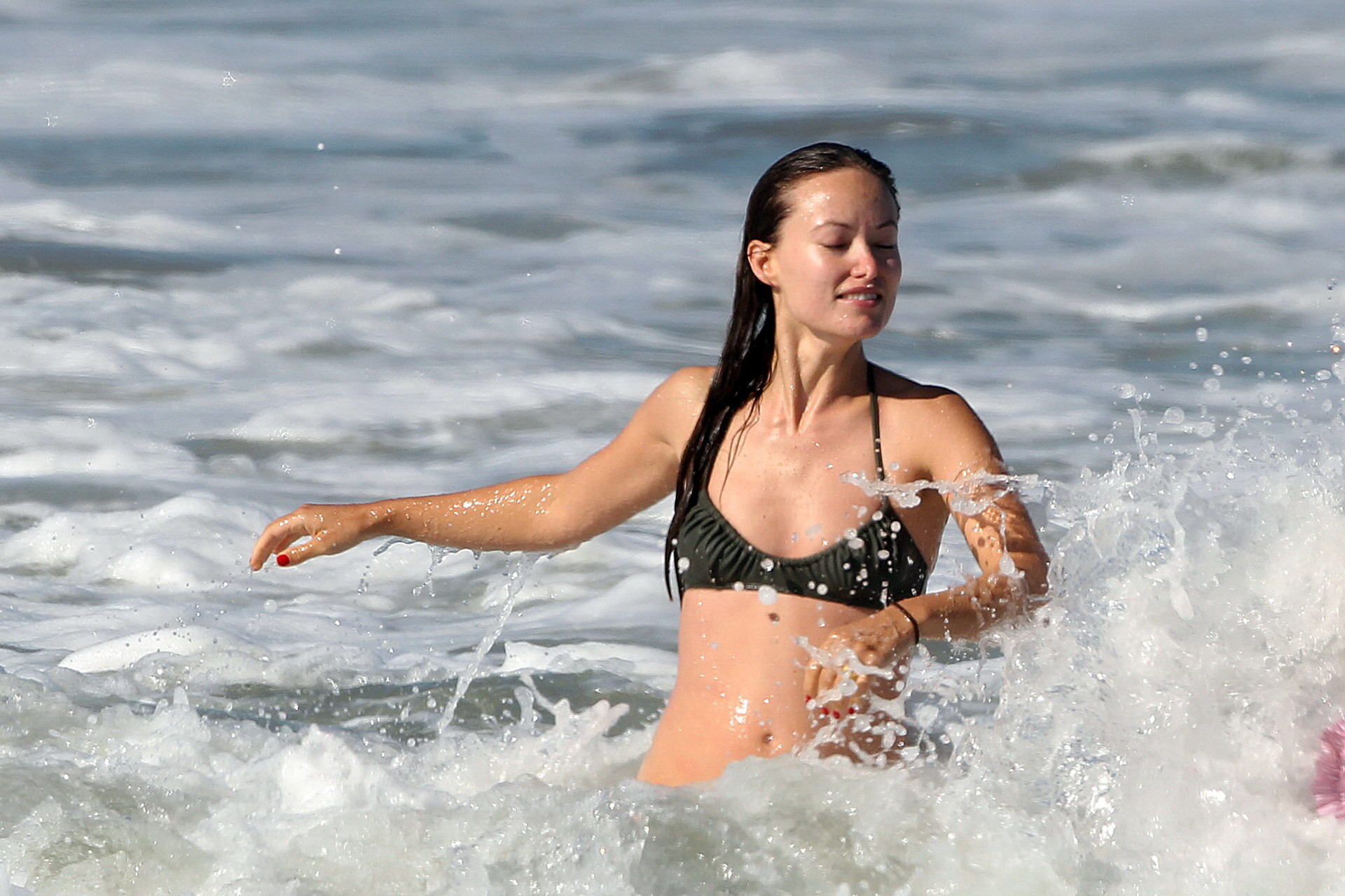 Olivia Wilde looking very sexy in wet bikini on the beach #75335298