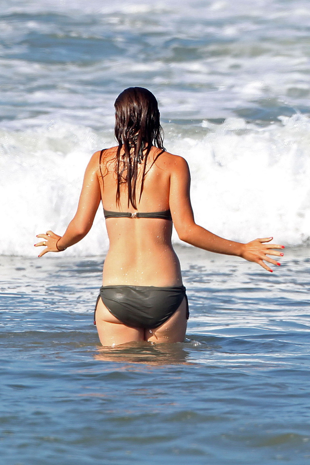 Olivia Wilde looking very sexy in wet bikini on the beach #75335363