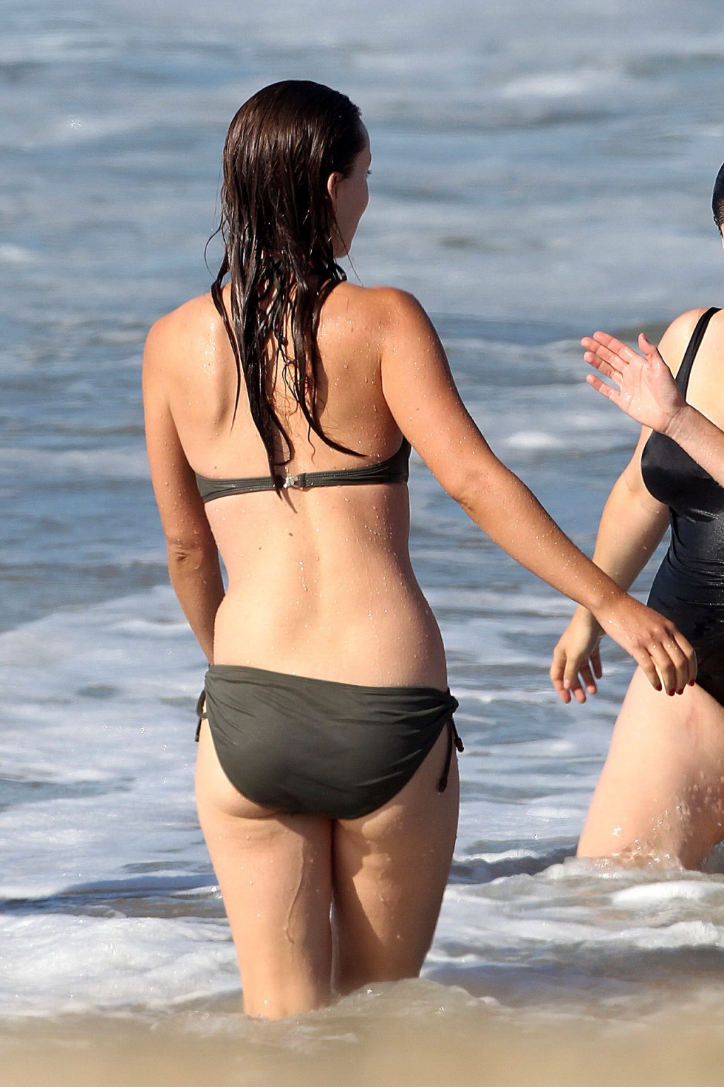Olivia Wilde looking very sexy in wet bikini on the beach #75335385
