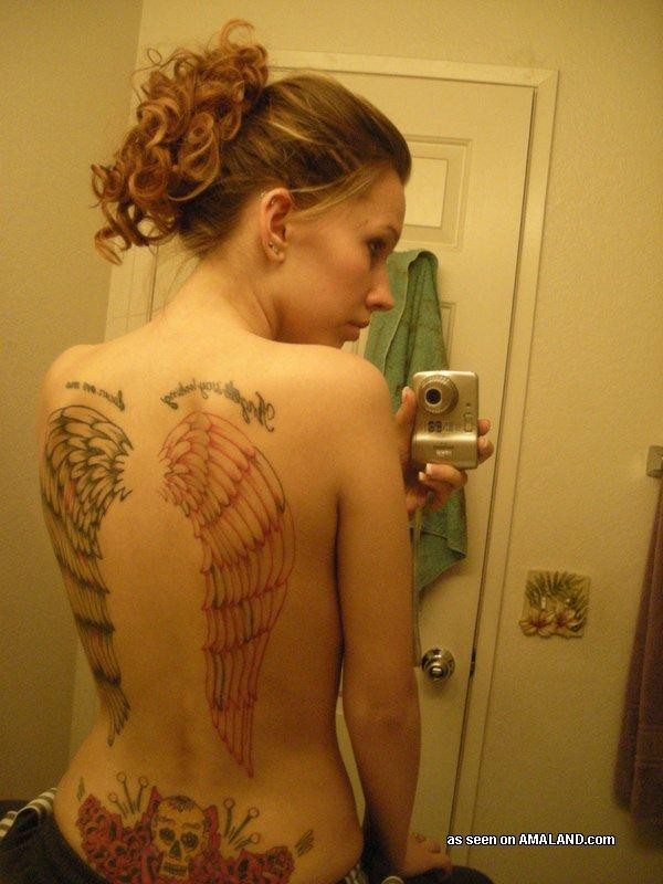 Emo chick showing off her sexy inked back #68288335