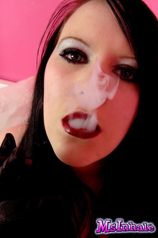 goth teen smoking a cigarette #74983211