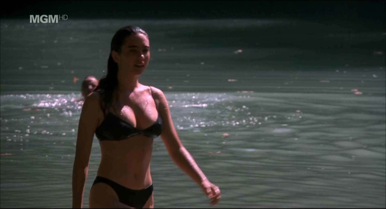 Jennifer Connelly showing her nice boobs and pussy from behind on beach in movie #75309147