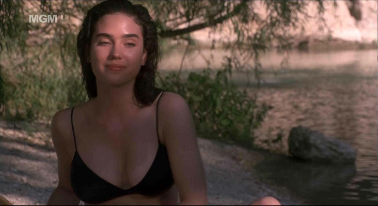 Jennifer Connelly showing her nice boobs and pussy from behind on beach in movie #75309190