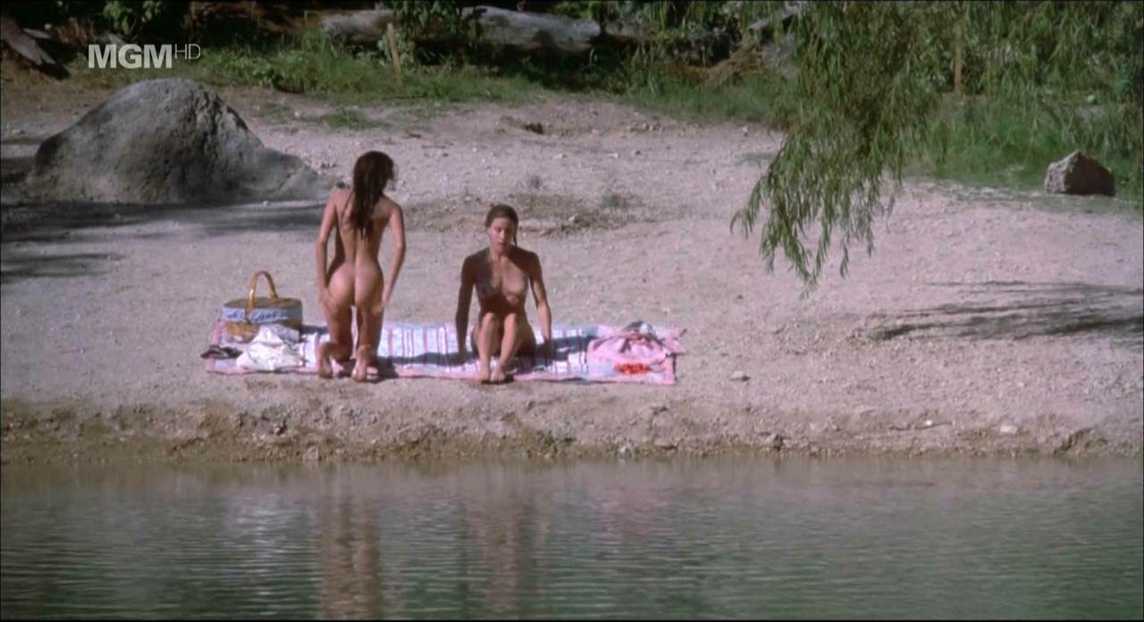 Jennifer Connelly showing her nice boobs and pussy from behind on beach in movie #75309216