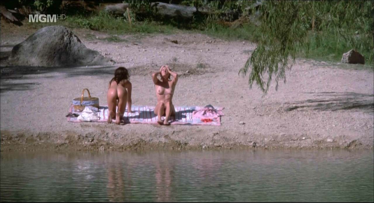 Jennifer Connelly showing her nice boobs and pussy from behind on beach in movie #75309223